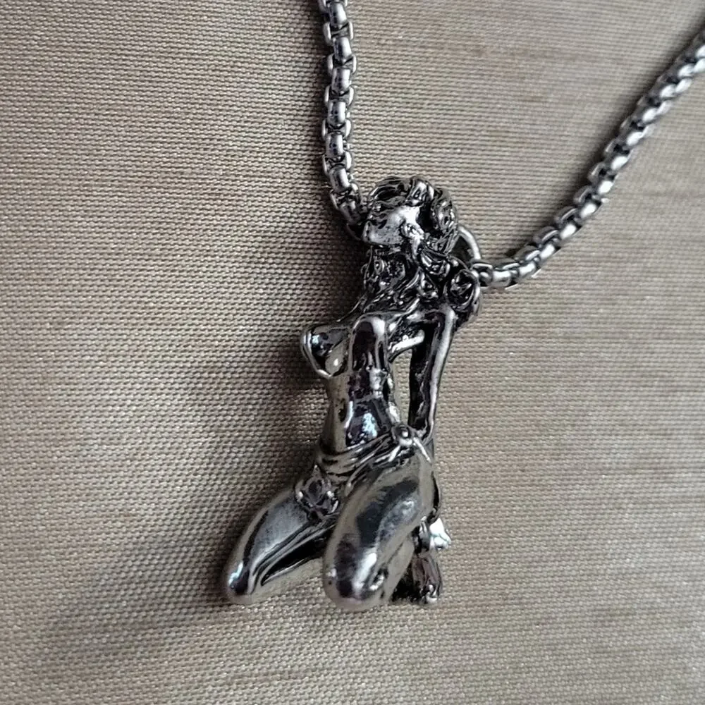 Bound woman kneeling necklace